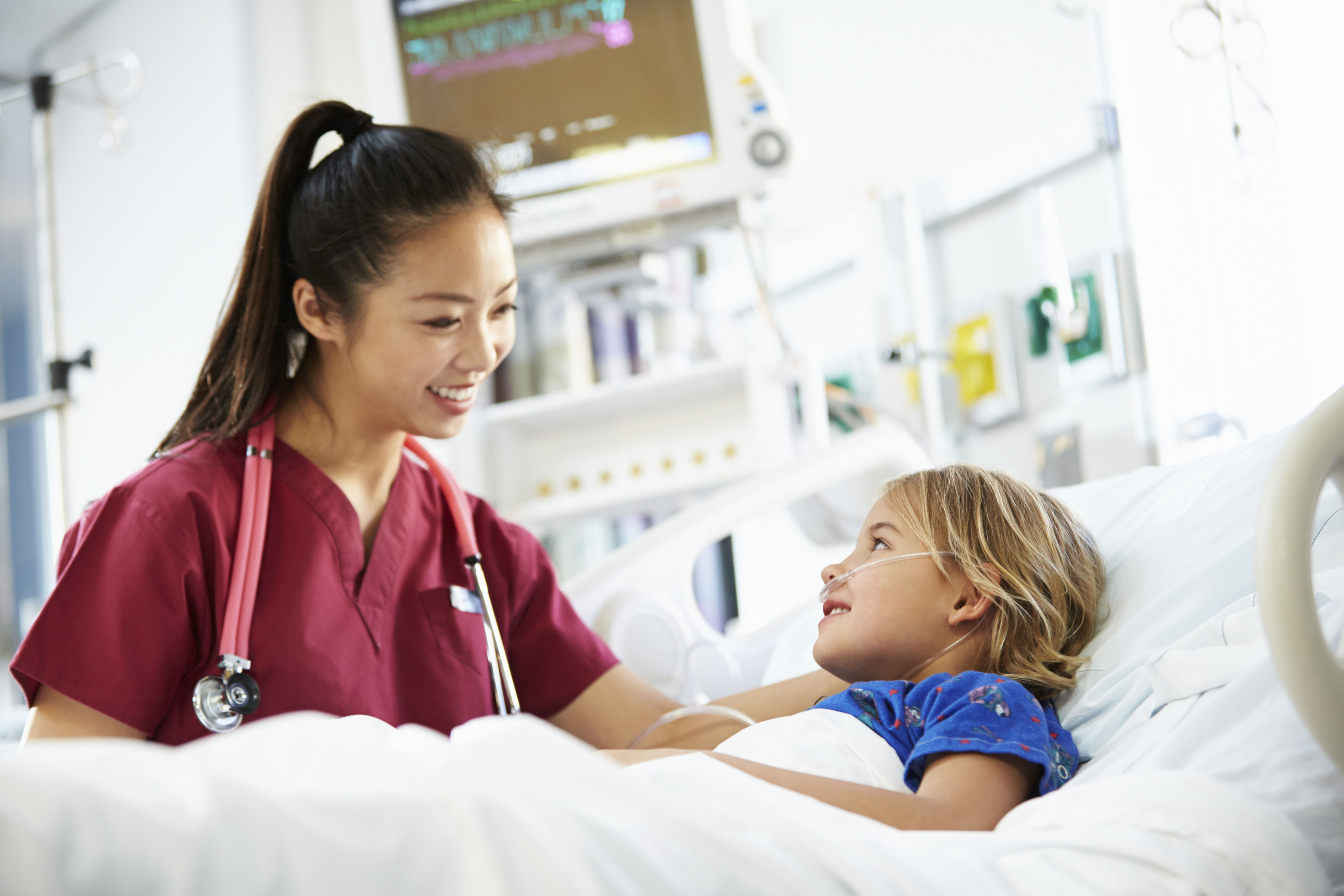 nurse practitioner taking care of a child